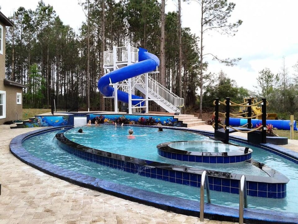 Side view of the large GO FISH pool & Lazy River....