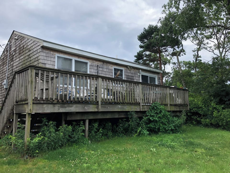 large, long deck along back side of house, 50' from salt marsh, great views