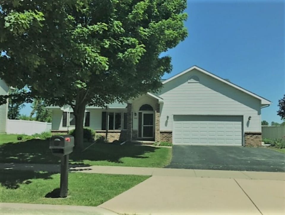 Beautiful landscaped yard on a quiet street.
