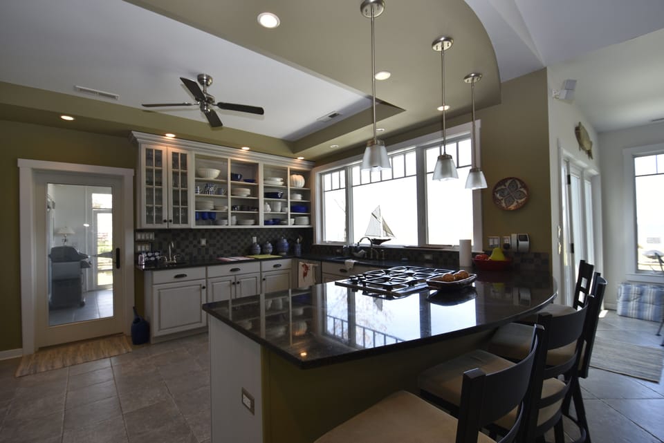 Our Well equipped kitchen and breakfast bar