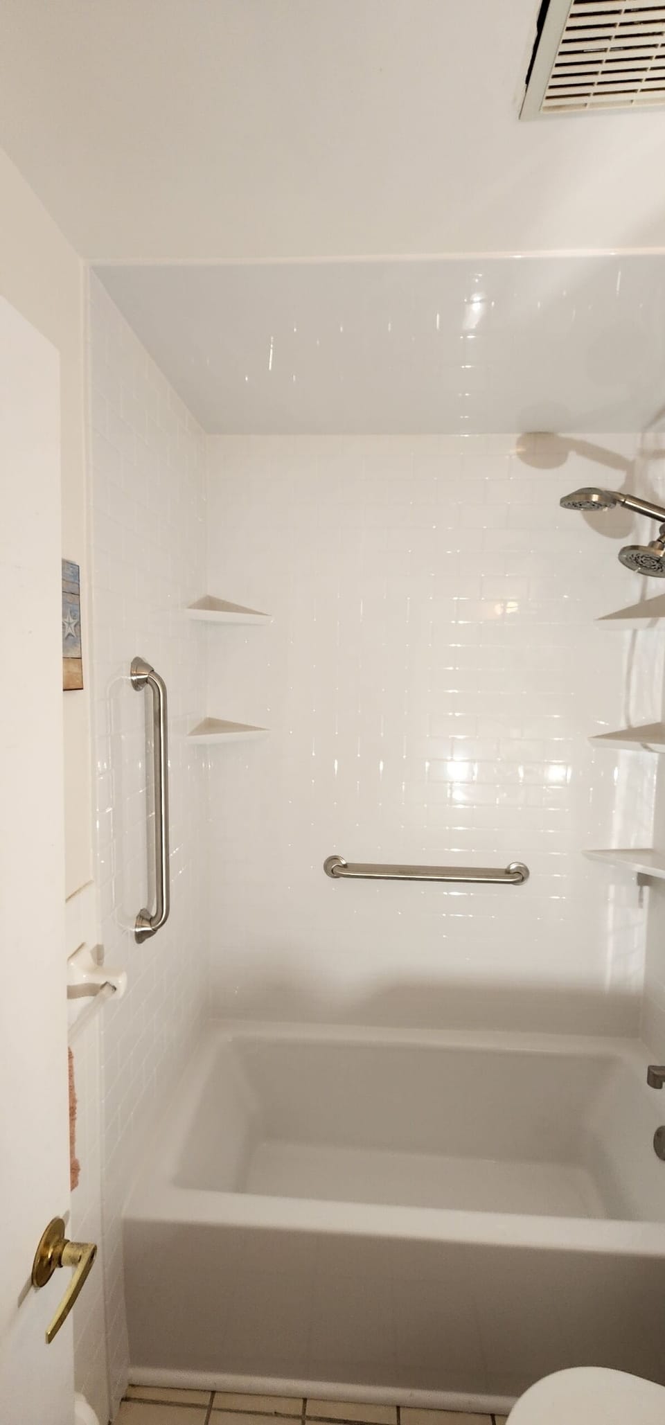 New tub/shower combo  in primary bathroom.