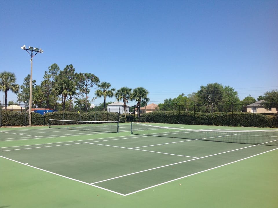 Two tennis courts. Floodlit for night play