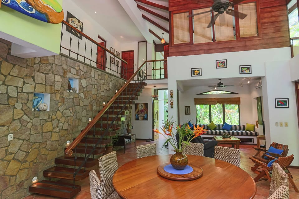 Open flowing dining, kitchen and living space! open air or fully a/c'd