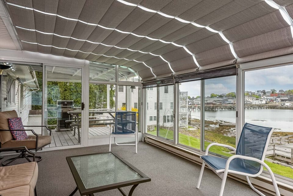 A perfect spot for a morning coffee! Sun room with retractable ceiling
