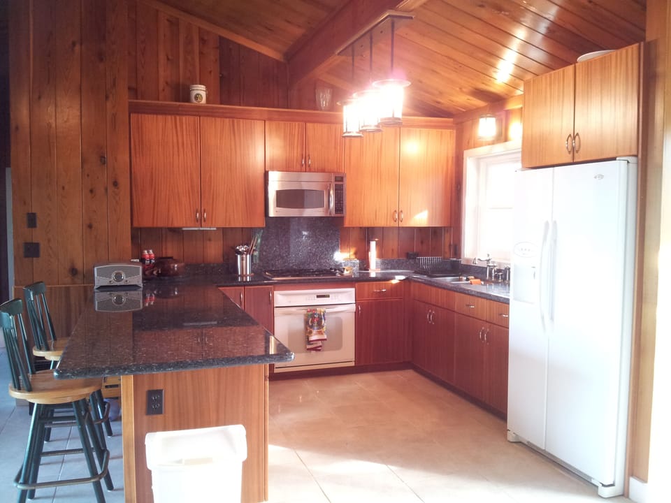 Spacious kitchen with eating bar