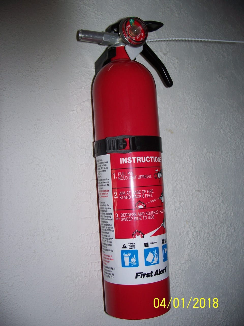 Fire Extinguisher in the hallway.