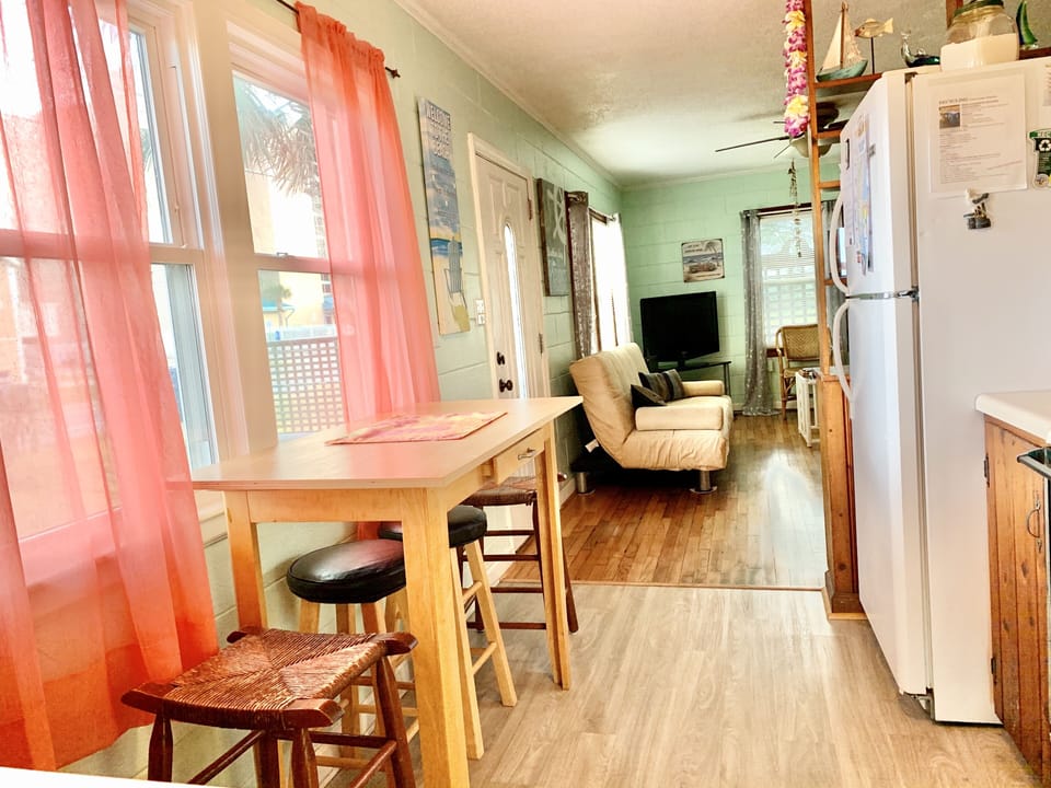 Kitchen we have foldable tables in living room and for more space outside tables