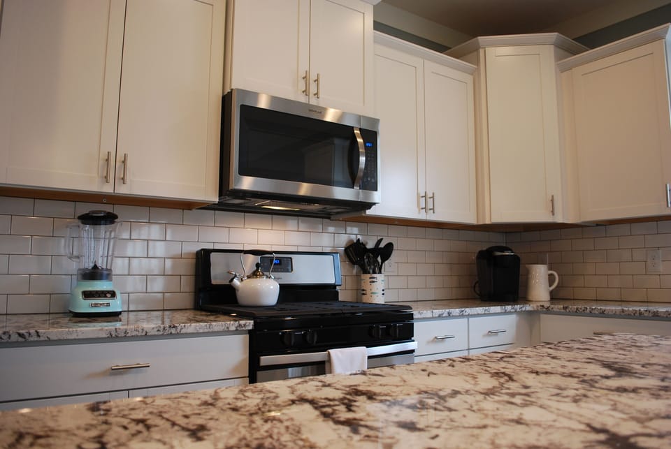 Full kitchen with beautiful granite counter top and large attached pantry.  