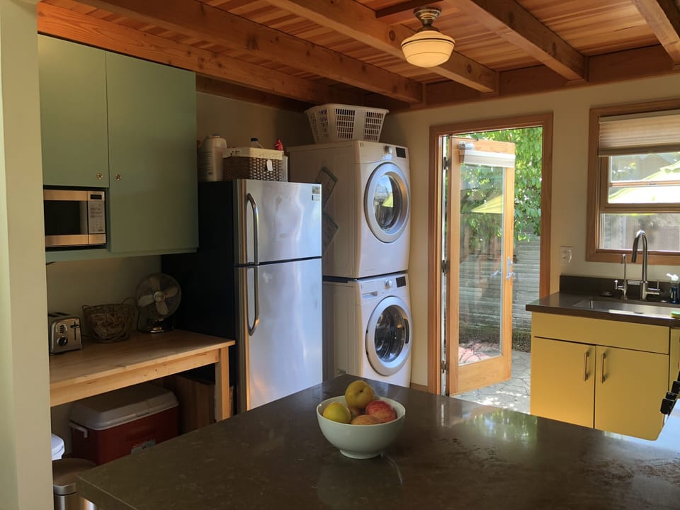 Kitchen view with washer and dryer
