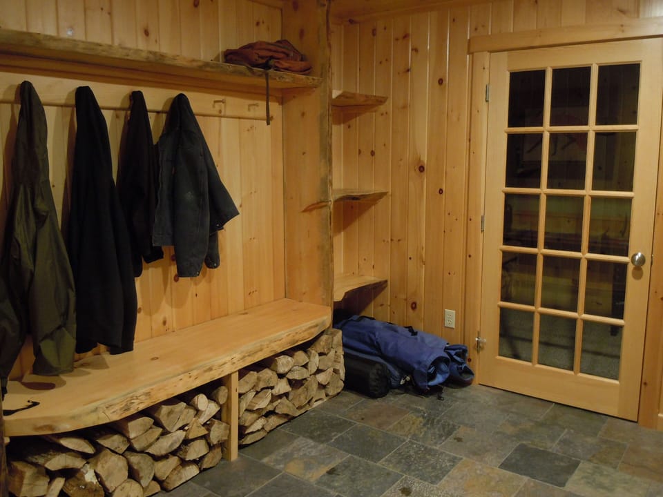 Ground floor entry through over-sized mudroom. 