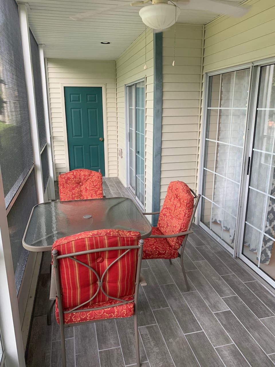Screened in porch that you can walkout to the Charcoal grill and the outdoors. 