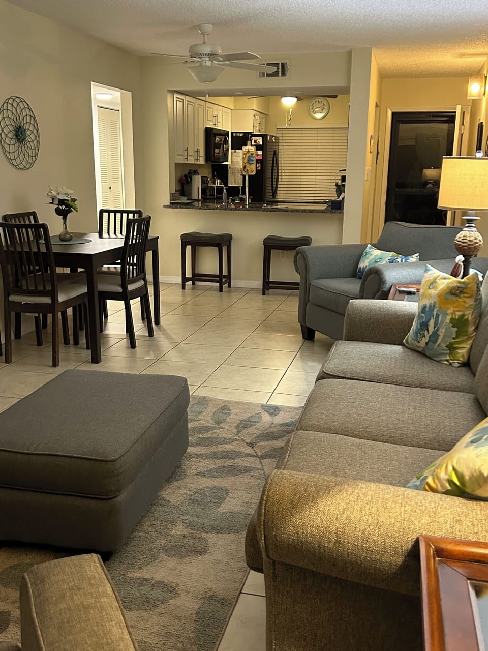 Spacious living room has expandable dining table to seat 8