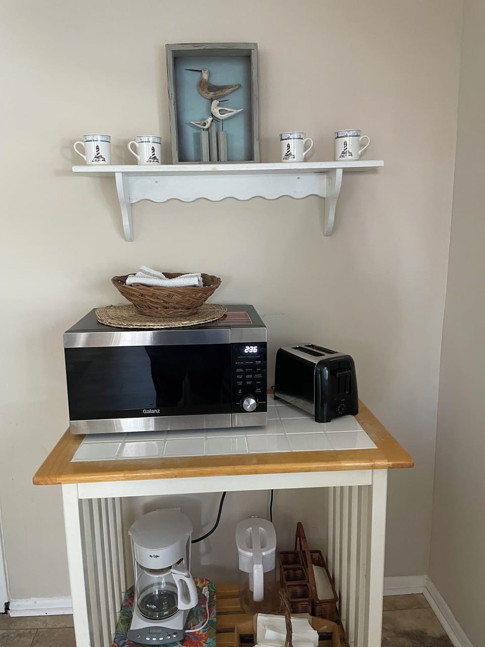 Microwave and toaster for your convenience.