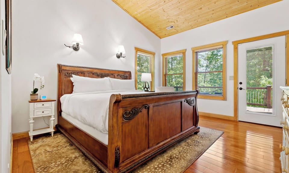 On the main level are two suites, each with adjoining full baths, and deck access