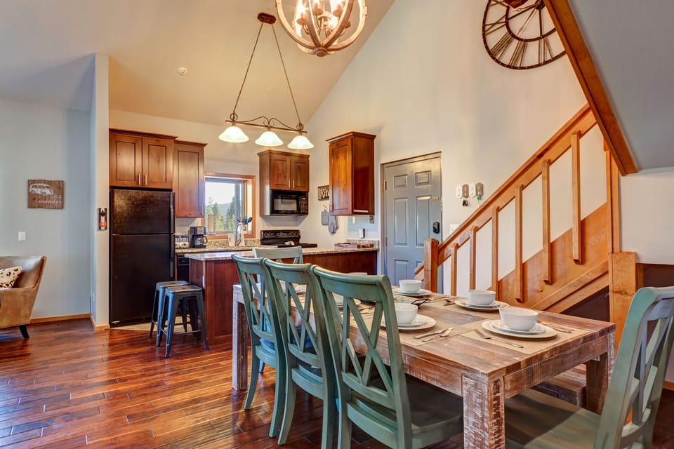 The dining table seats 8 and there is additional seating at the kitchen island.