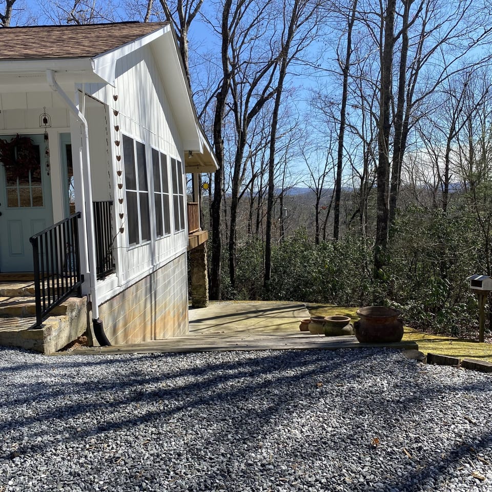 Walkway to the bottom terrace where we a additional seating, swing and BBQ