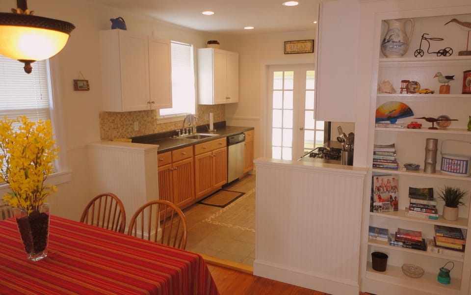 Dining Area, Kitchen, French Doors to Sun Room in Back