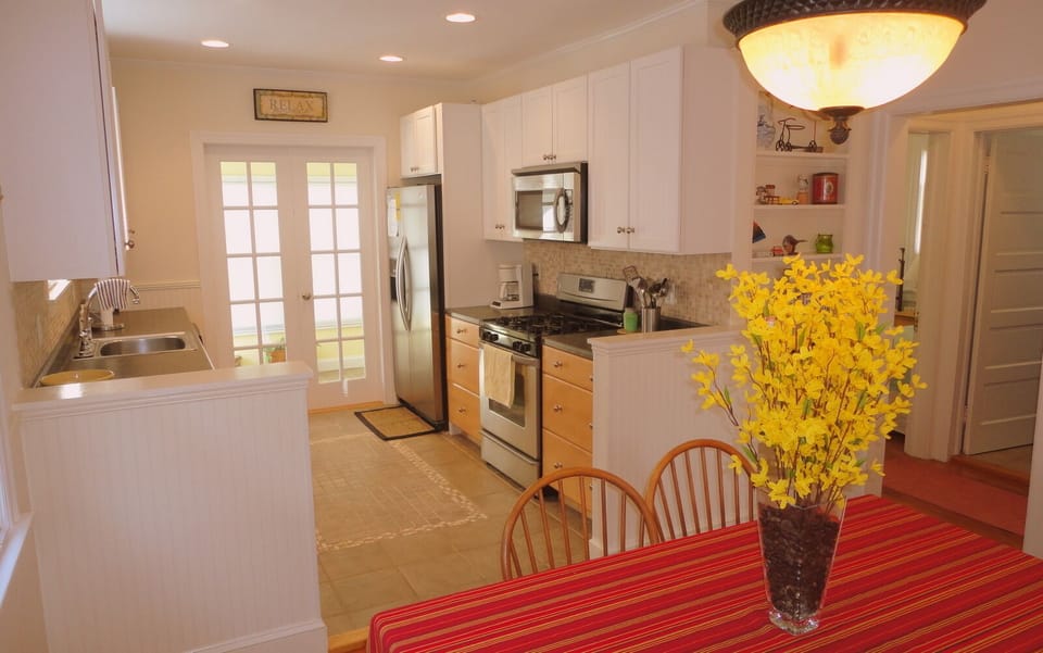 Dining Area, Kitchen, Hallway and Middle and Back Bedroom and Bathroom to Right