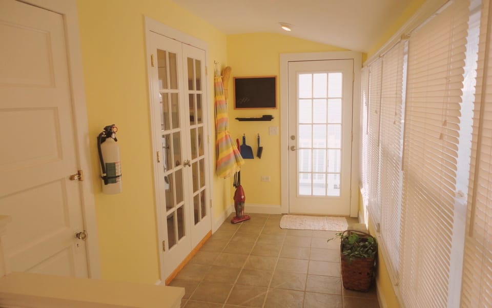 Sun Room, Door to Rear Deck in Back, French Doors to Kitchen on Left