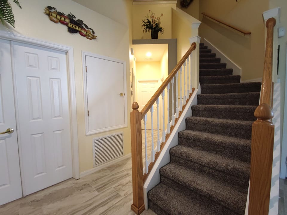 Second Downstairs Bedroom (King Bed), with en-suite Bathroom & Smart TV.