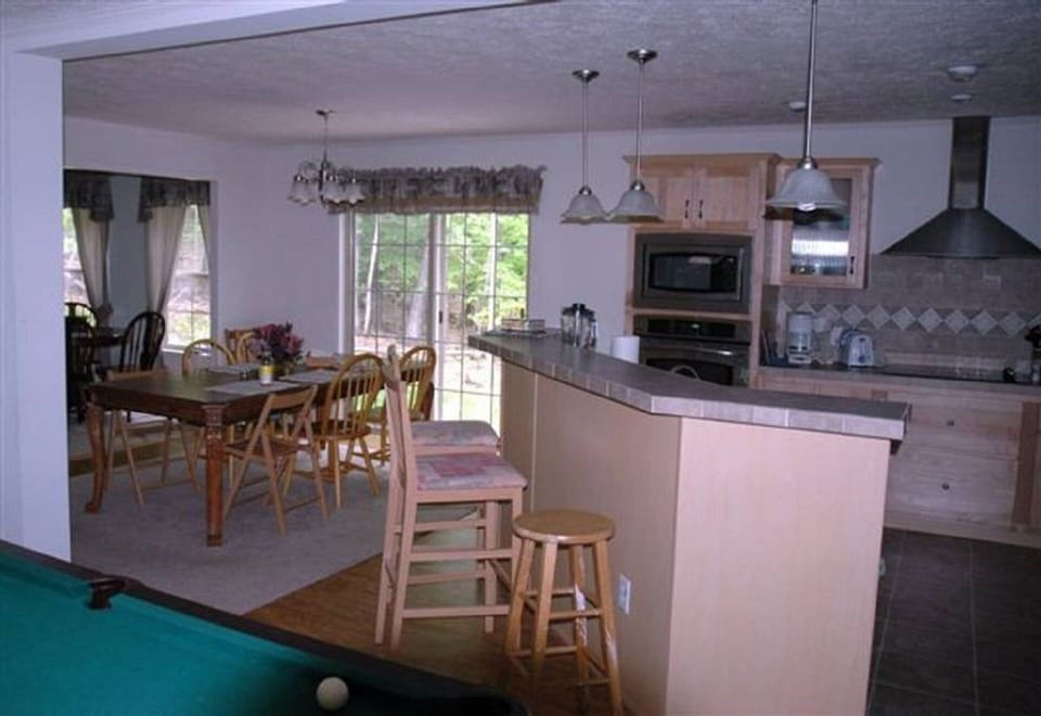 Kitchen and Dining Room Toward Rear Patio