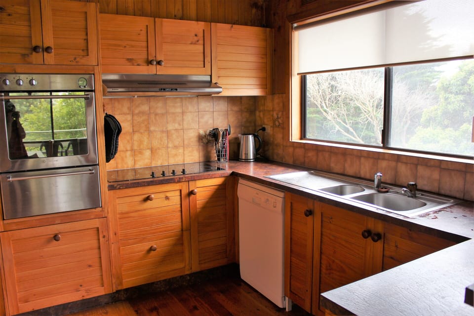 kitchen with dishwasher, stove, oven