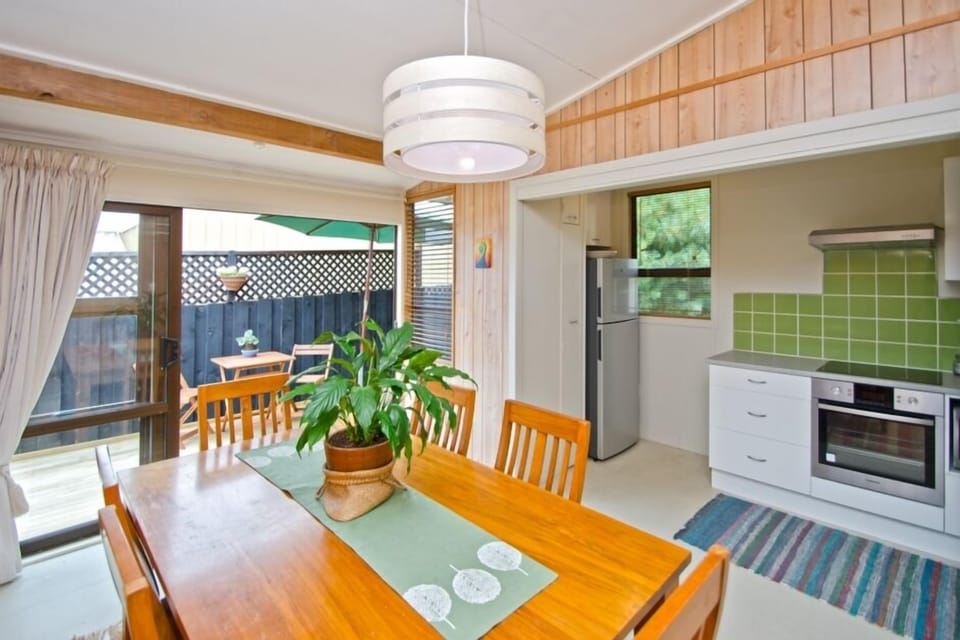 Kitchen and dining area looking out to east deck