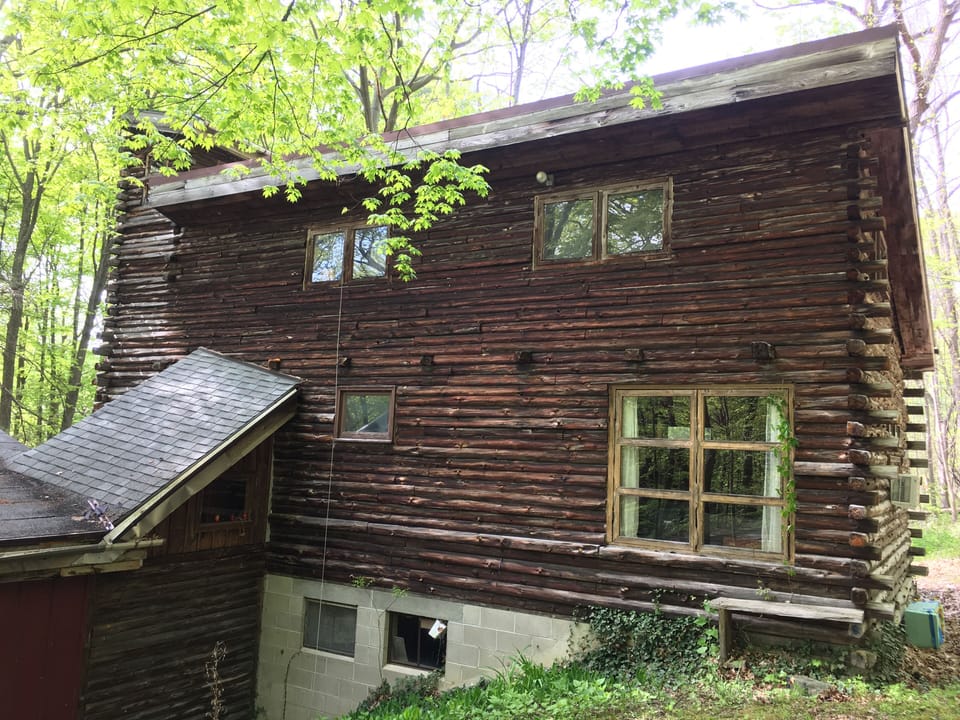 Hand-built log cabin extension