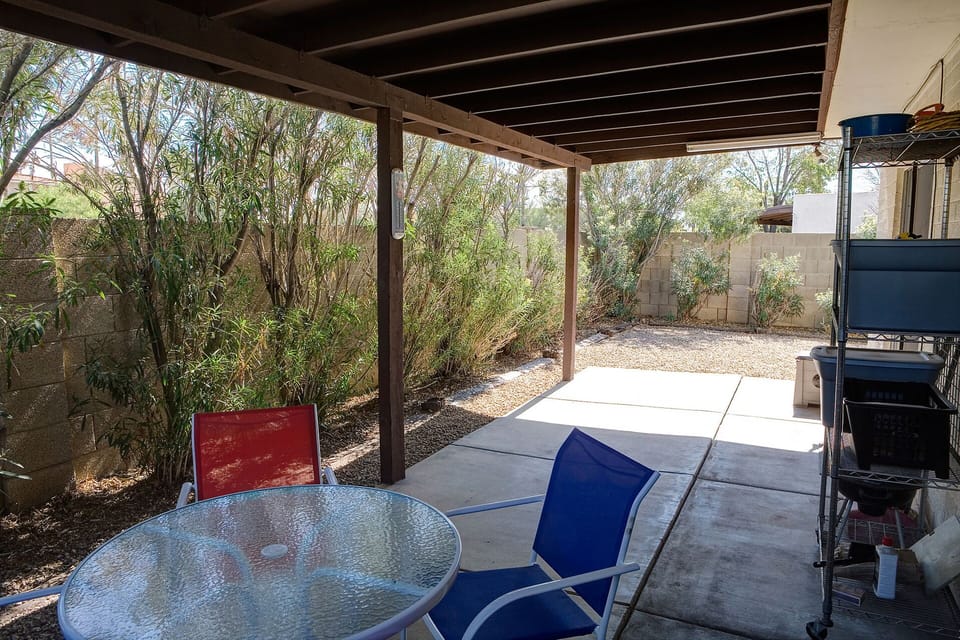 20' covered patio in private block fenced rear yard. 