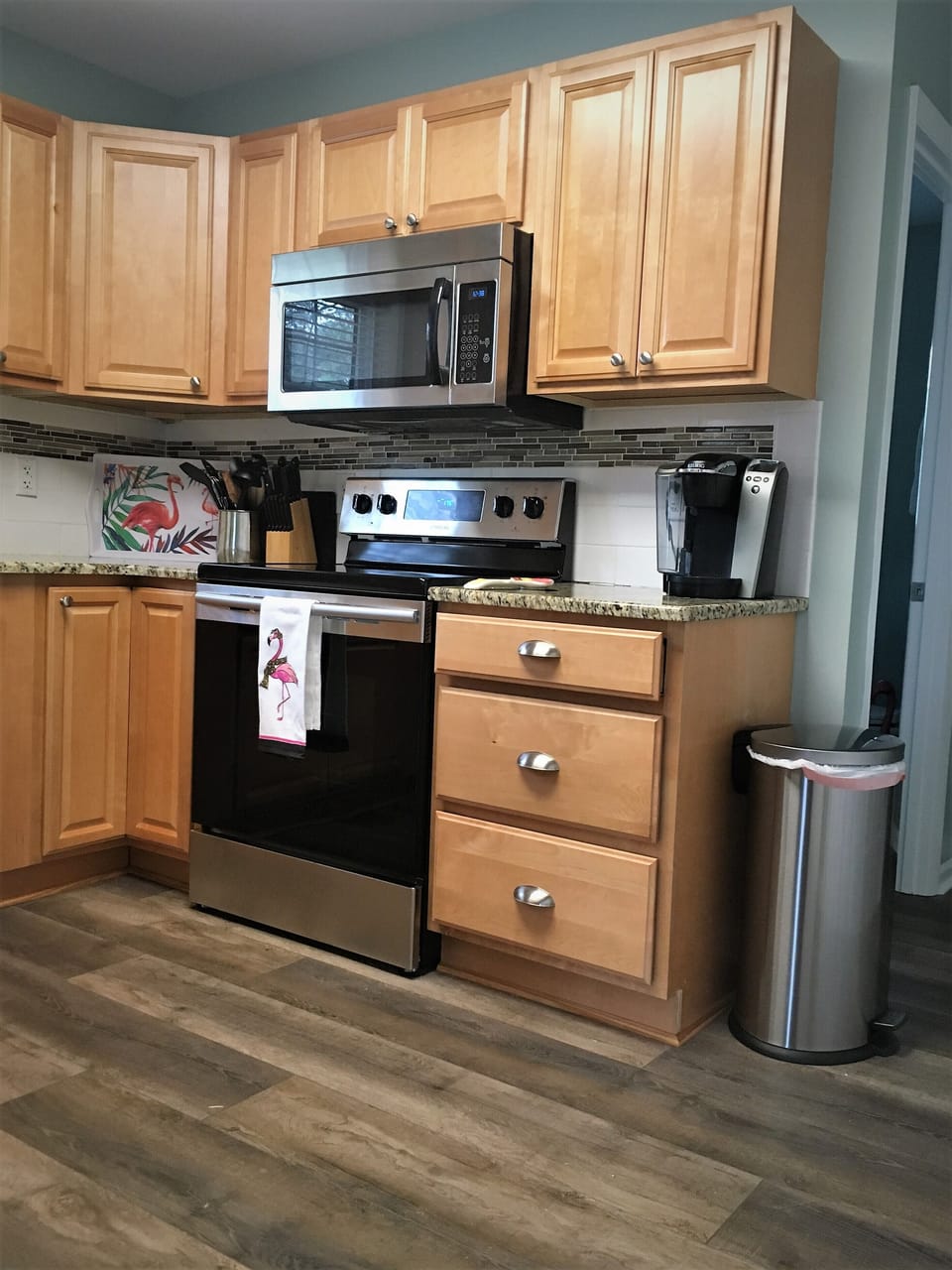 Modern appliances and access to Keurig coffee brewing. 