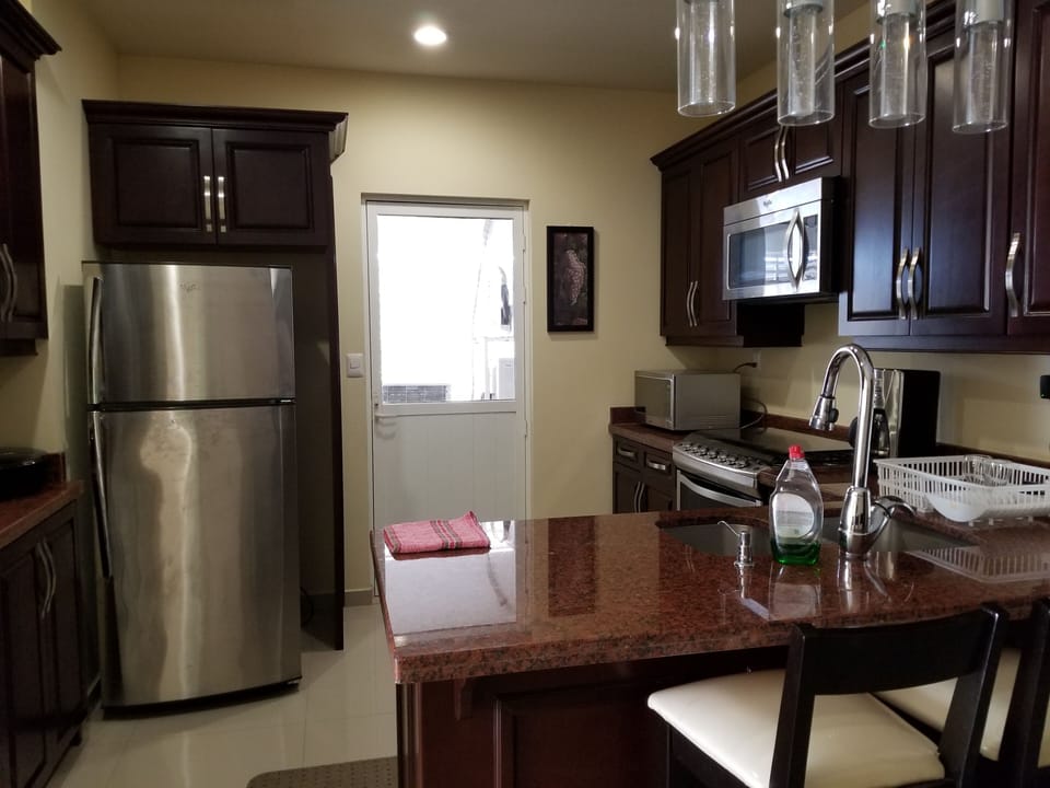Fully equipped kitchen to cook your favorite meals