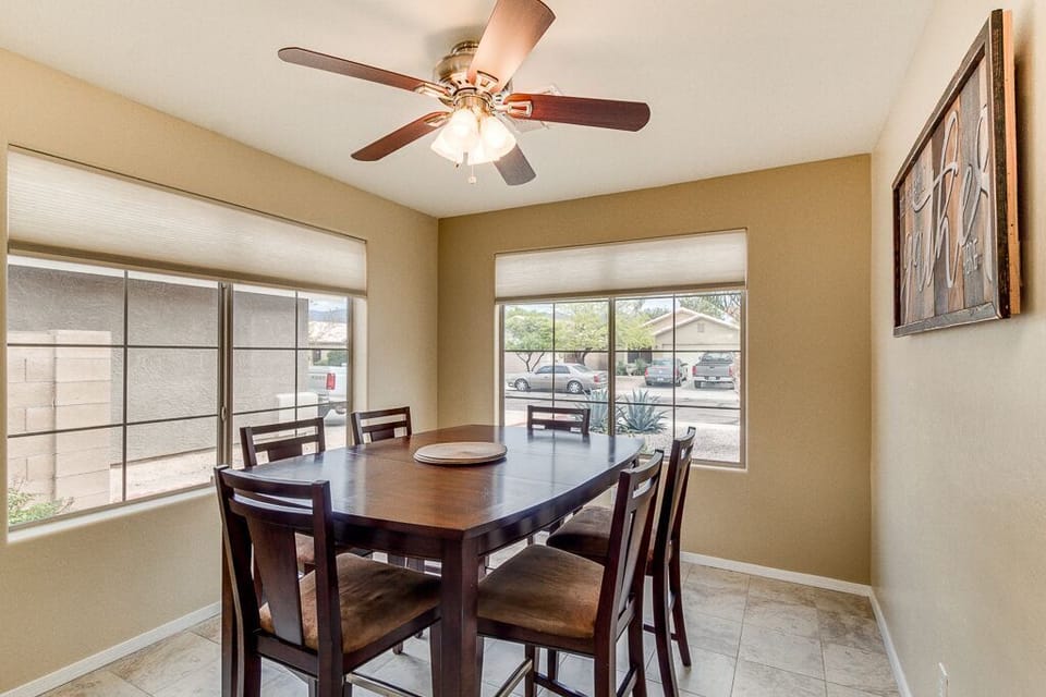 Two large Kitchen windows let in the sunlight 