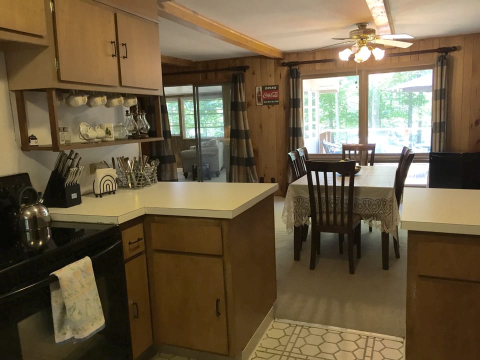 Kitchen and Dining Area With View of Lake