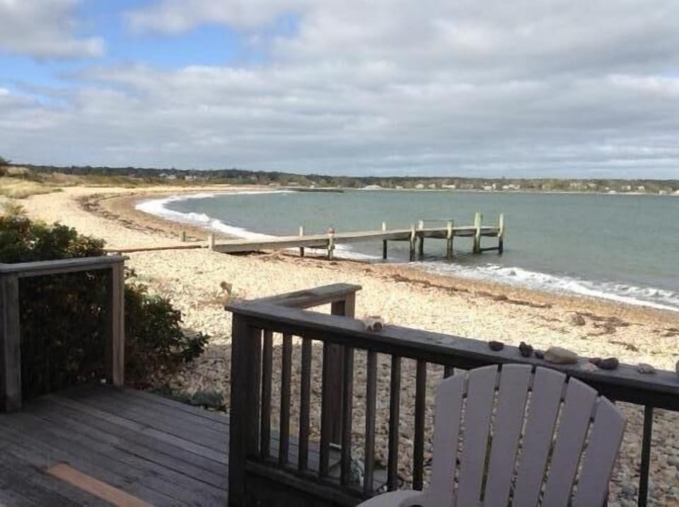 View from porch, shows updated steps to beach. Walk up beach to jetty.