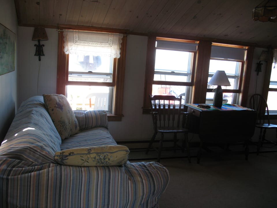 Living/dining room. Look out windows to ocean.
