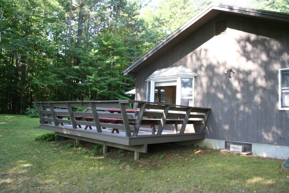 Deck has seating for well over 10 people.