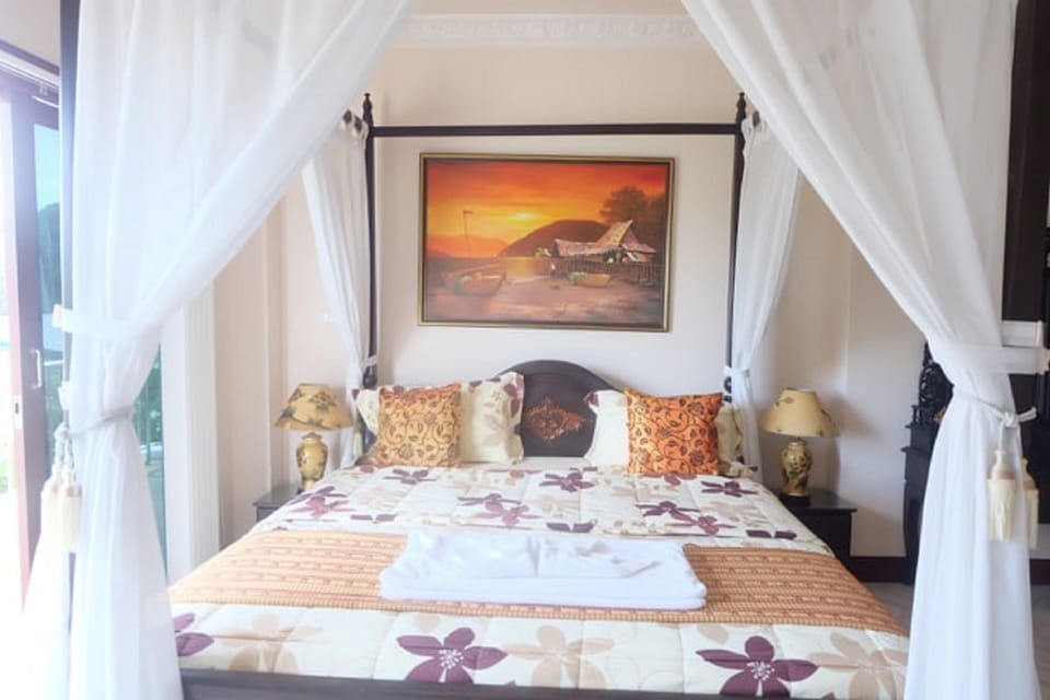 Room 6, king sized bed.