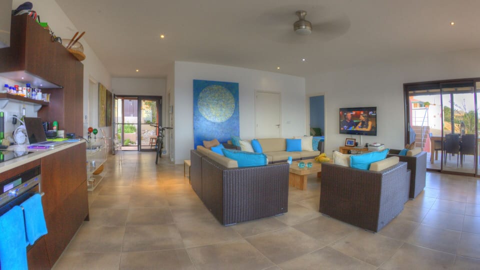 Open concept living, decorated with the owners own artistic creations!