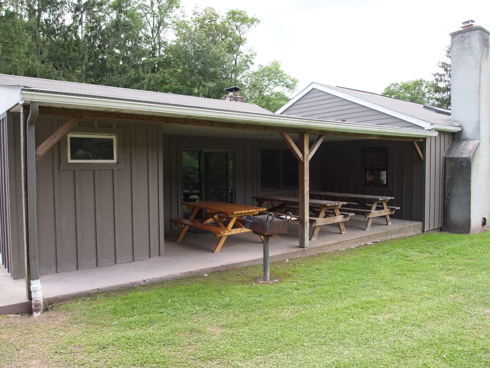 FARM HOUSE back patio and built-in grill, off the main living/dining area.