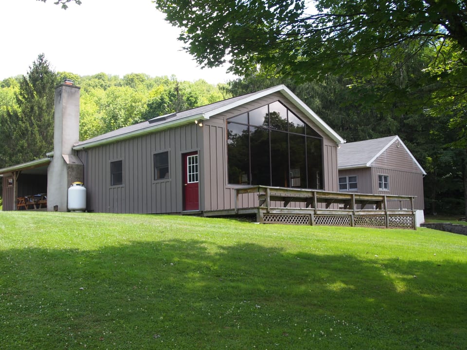 FARM HOUSE: another view from the big back yard. Notice the patio - back left.
