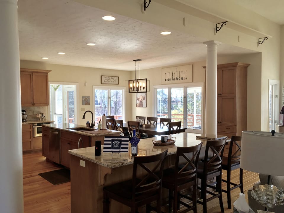 Plenty of seating at the Kitchen bar and Dining room table.