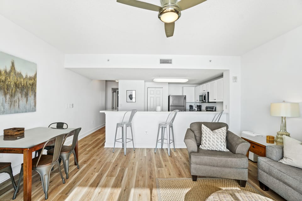 Large living area with ocean views and comfortable queen memory bed pullout