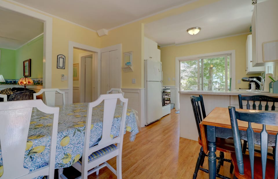 Dining & Kitchen with Sliders to Deck