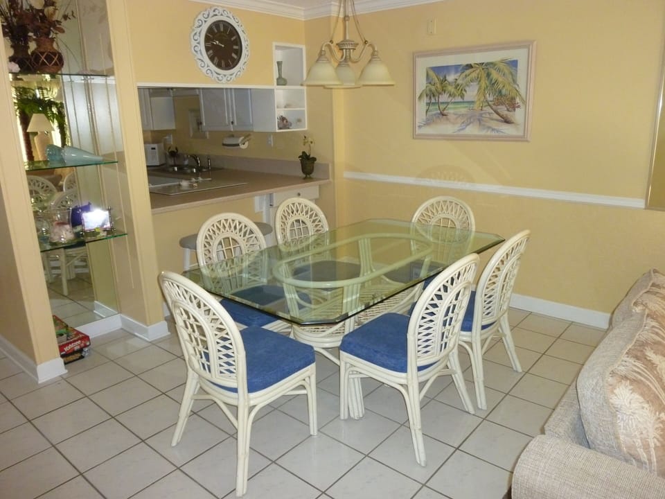 The dining area  seats six with additional bar stools.