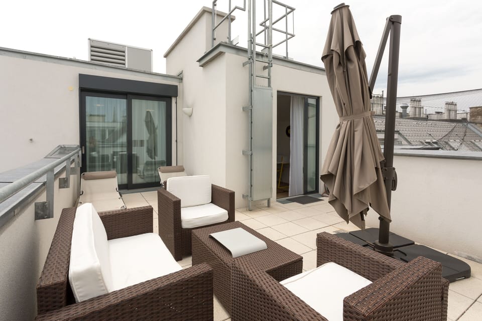 The open private terrace by the upper floor 