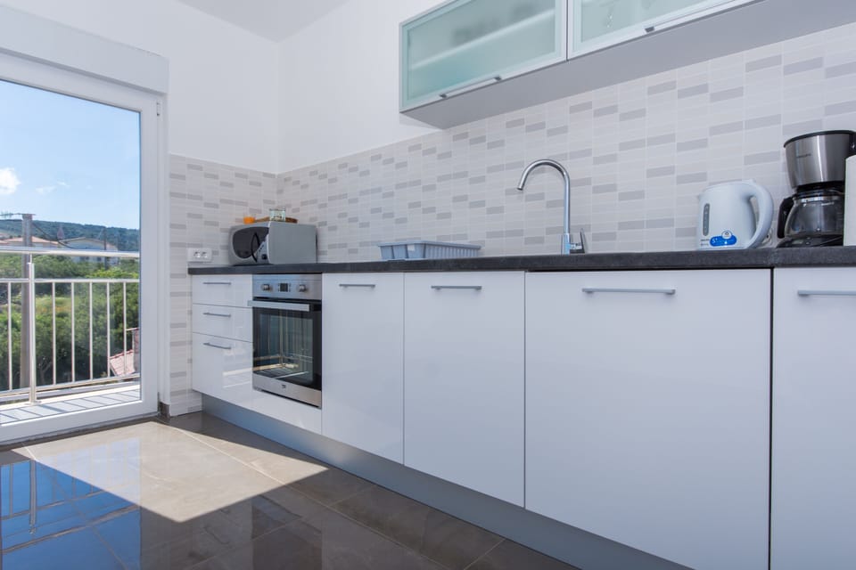 Kitchen with 2 balconies