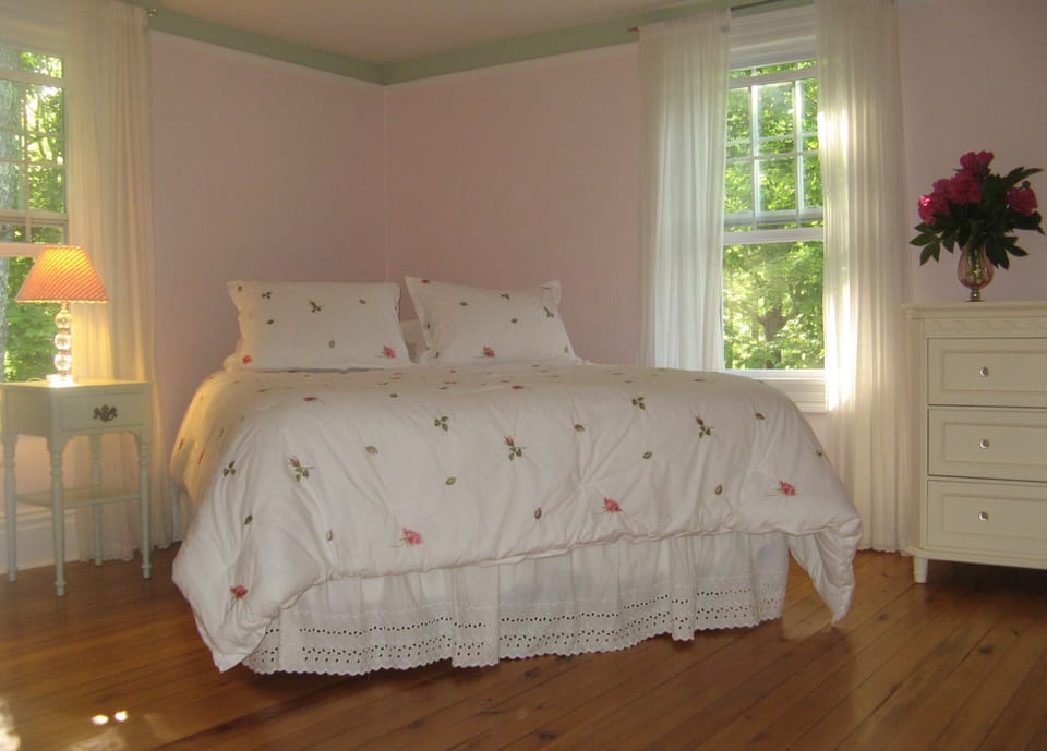 This upstairs bedroom is open and airy, and will charm any lady of any age.