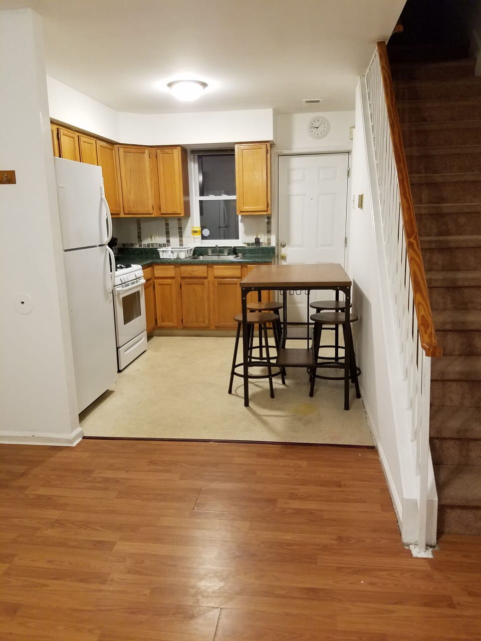 Eat in kitchen with all appliances, dishes and basic condiments