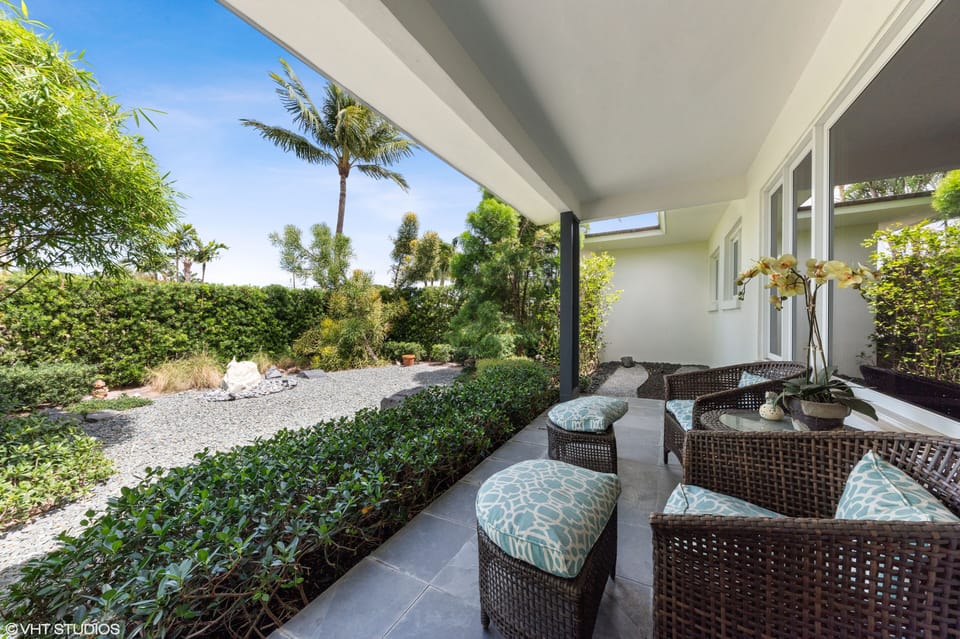 Enjoy a glass of wine overlooking Zen garden
