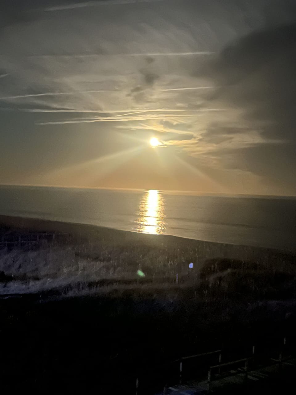 Moon over the ocean off the deck